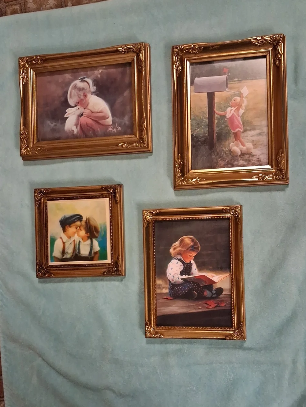 Set of Four Gold Ornate Picture Frames with Child-Themed Prints Donald Zolam